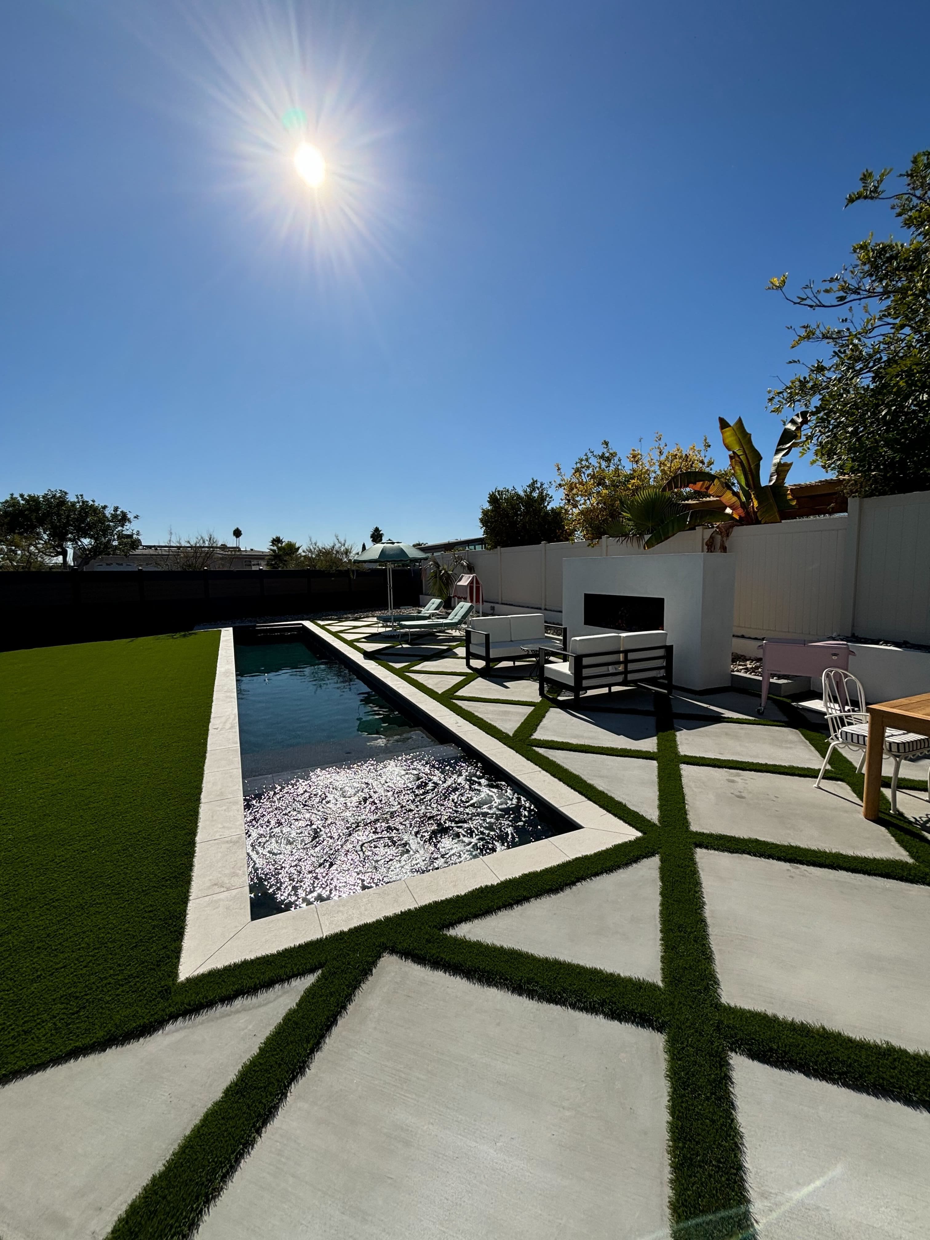 Pool and landscape lighting at dusk