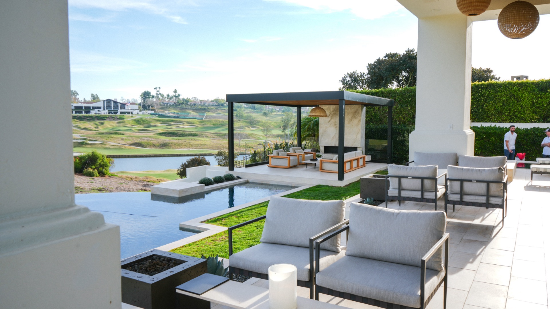 Infinity-edge pool overlooking the golf course, designed and built by Abshire Brothers Lawn & Landscape in Lafayette, Acadiana