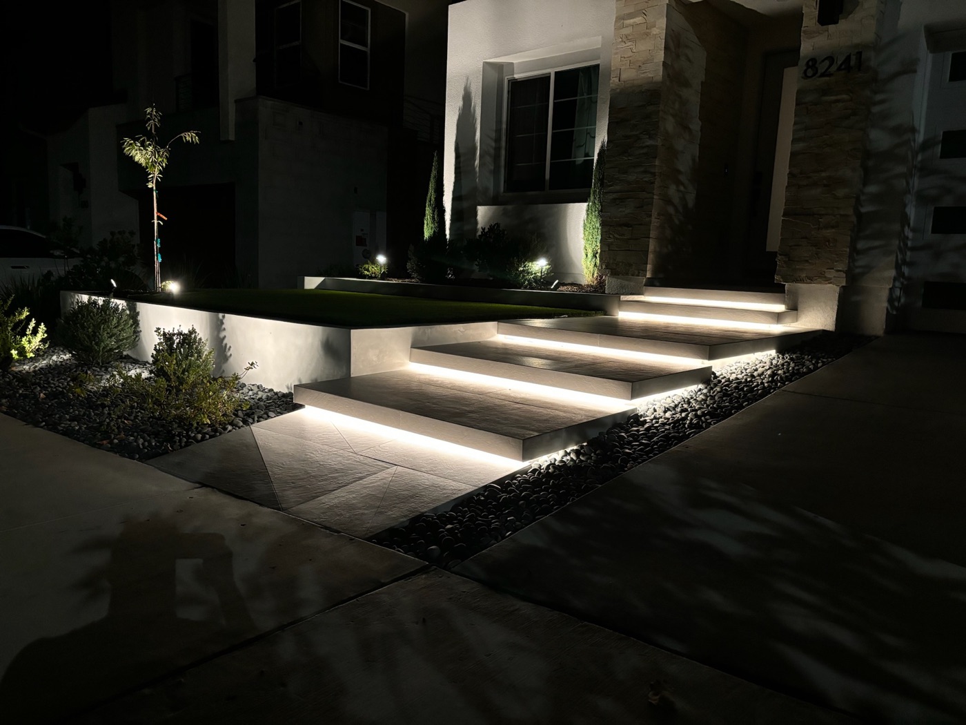 Illuminated floating entry steps in Youngsville by Abshire Brothers Lawn & Landscape