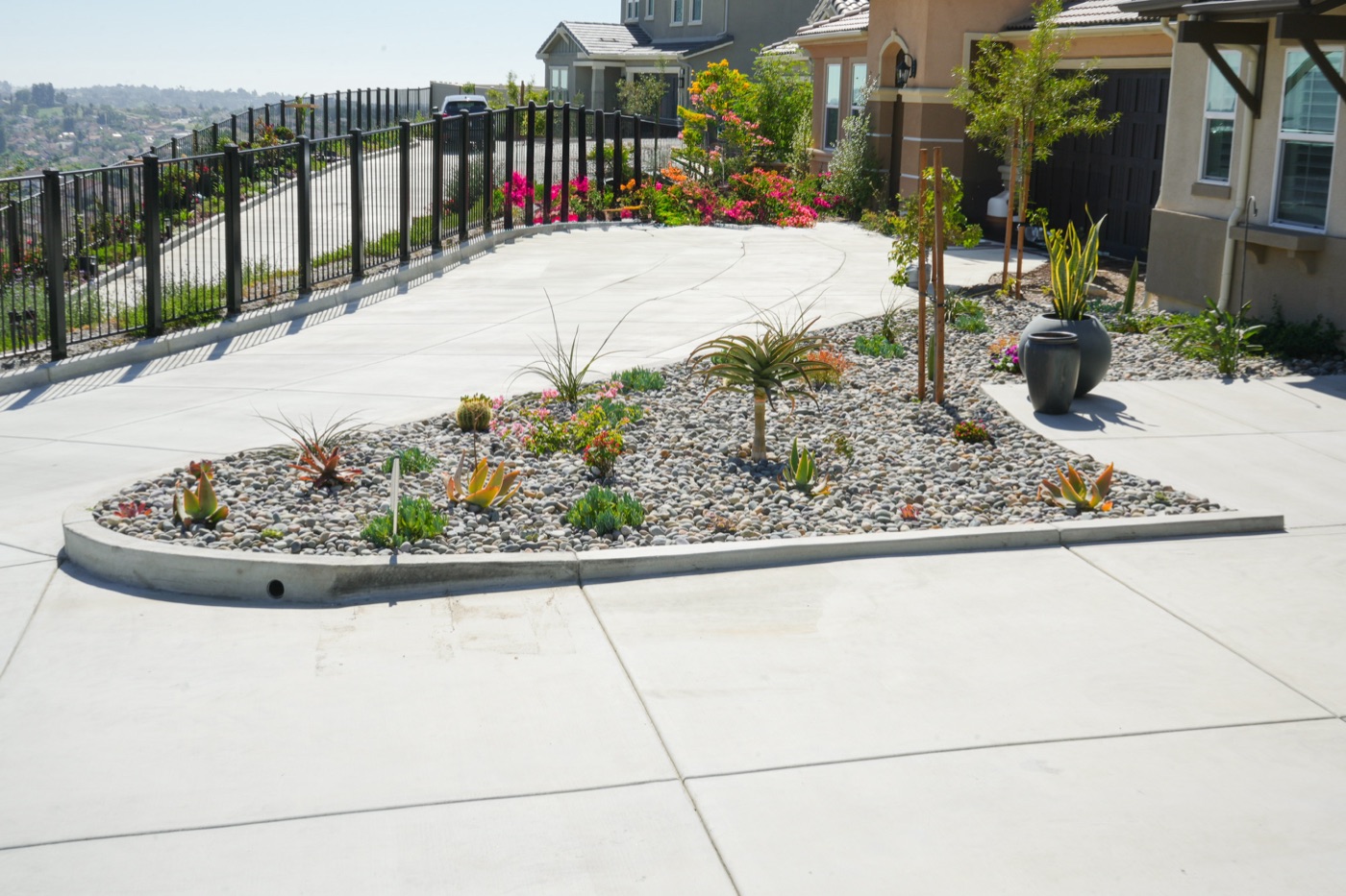 Paver patio with landscape lighting at dusk in Carencro by Abshire Brothers Lawn & Landscape