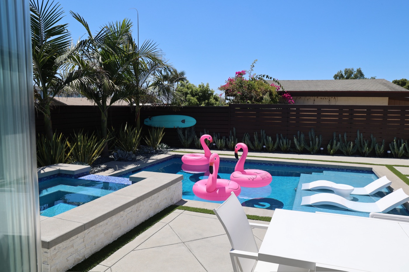 Pool and spa with a sun deck in Abbeville by Abshire Brothers Lawn & Landscape