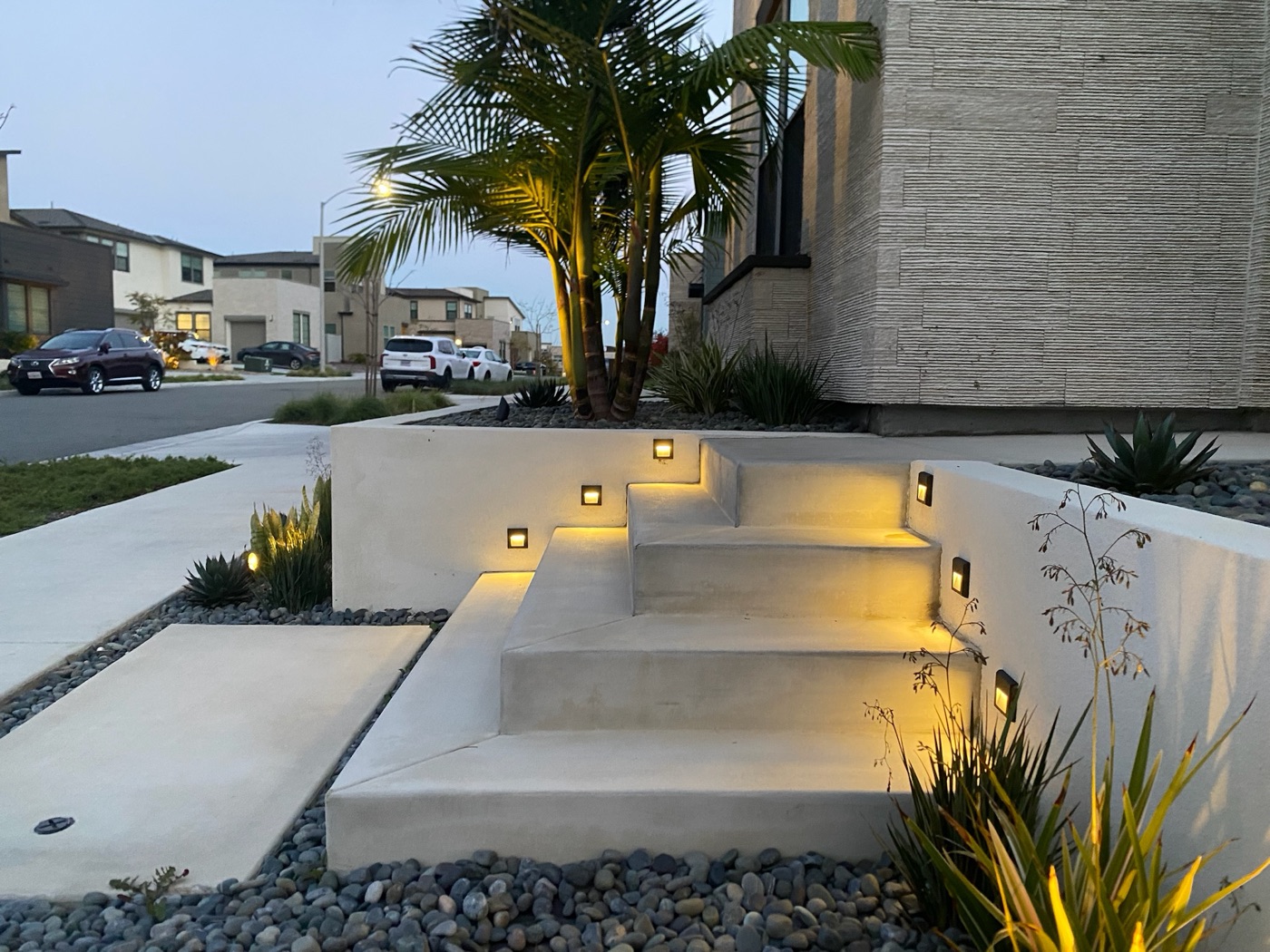 Pool with a raised spa and privacy fence in Abbeville by Abshire Brothers Lawn & Landscape