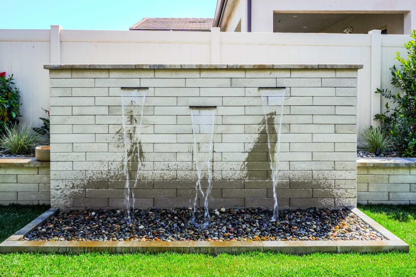 Cast-stone water feature wall in Abbeville by Abshire Brothers Lawn & Landscape
