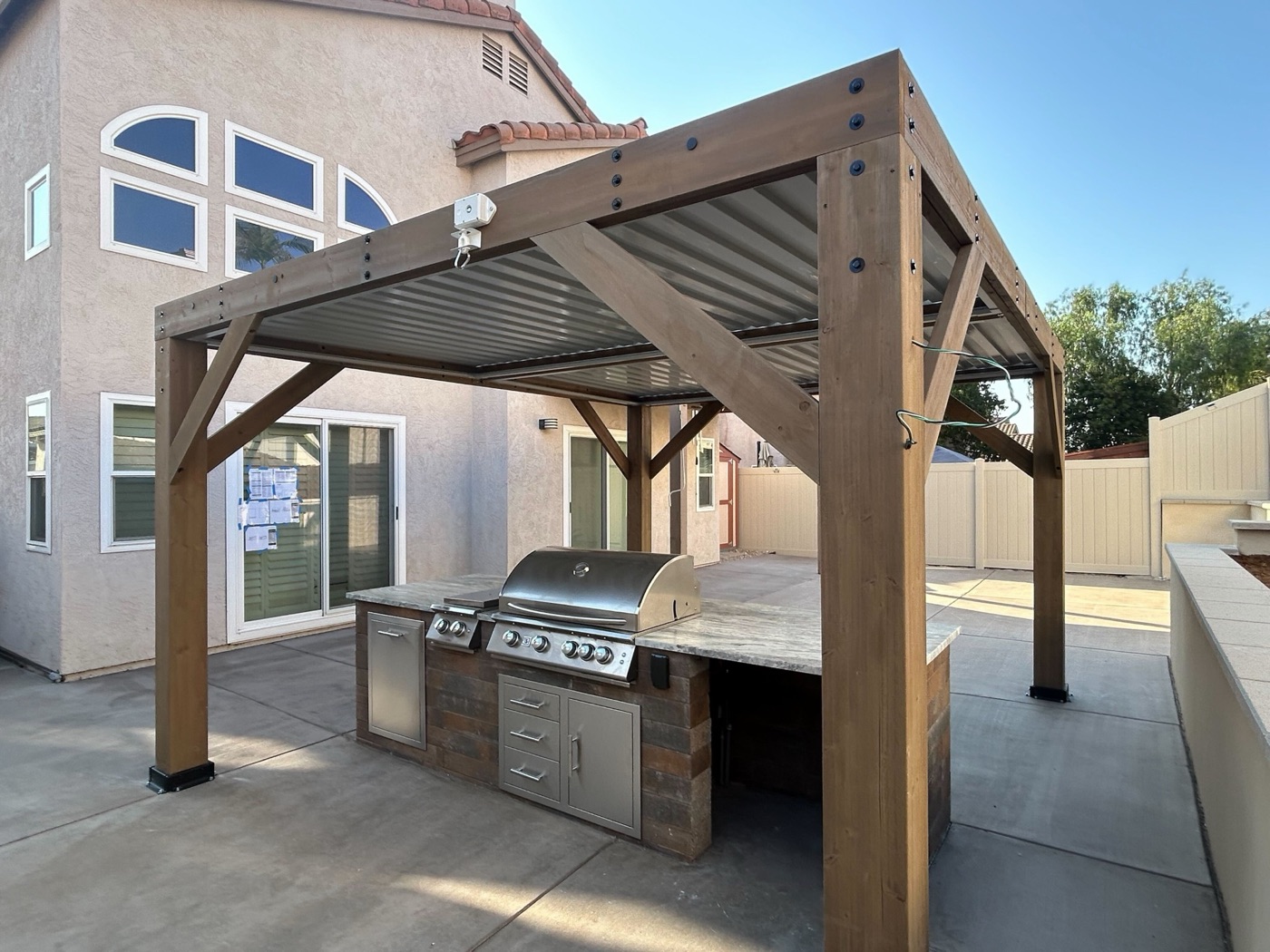 Drought-tolerant planting and hardscape by Abshire Brothers Lawn & Landscape in Iota