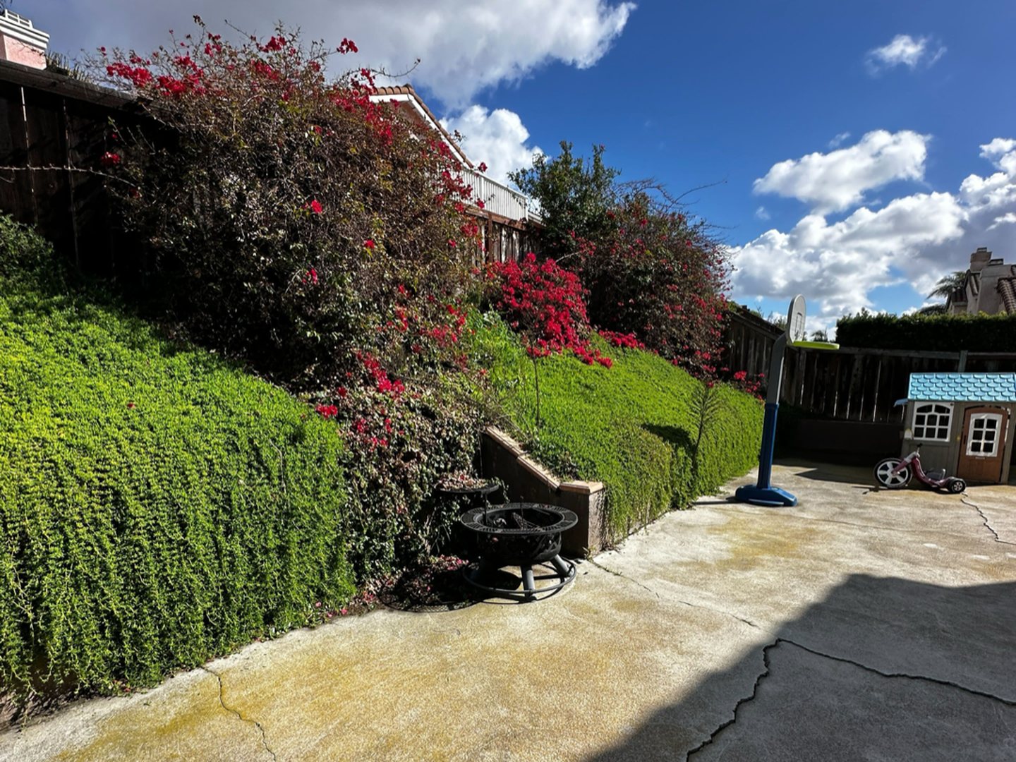 Before: Slope Retaining Wall, Patio & Pergola